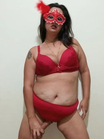 showing off wearing red lingerie         