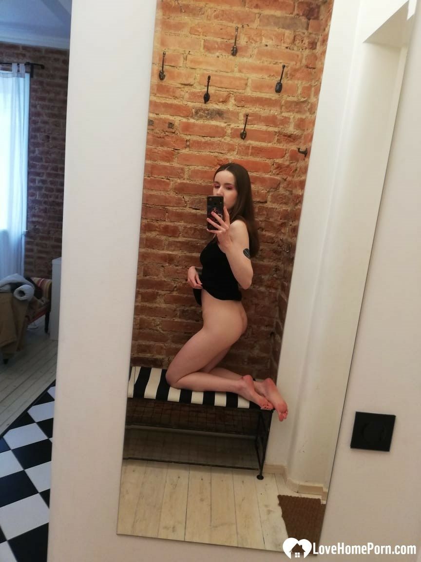 Skinny teen takes selfies in the mirror #17
