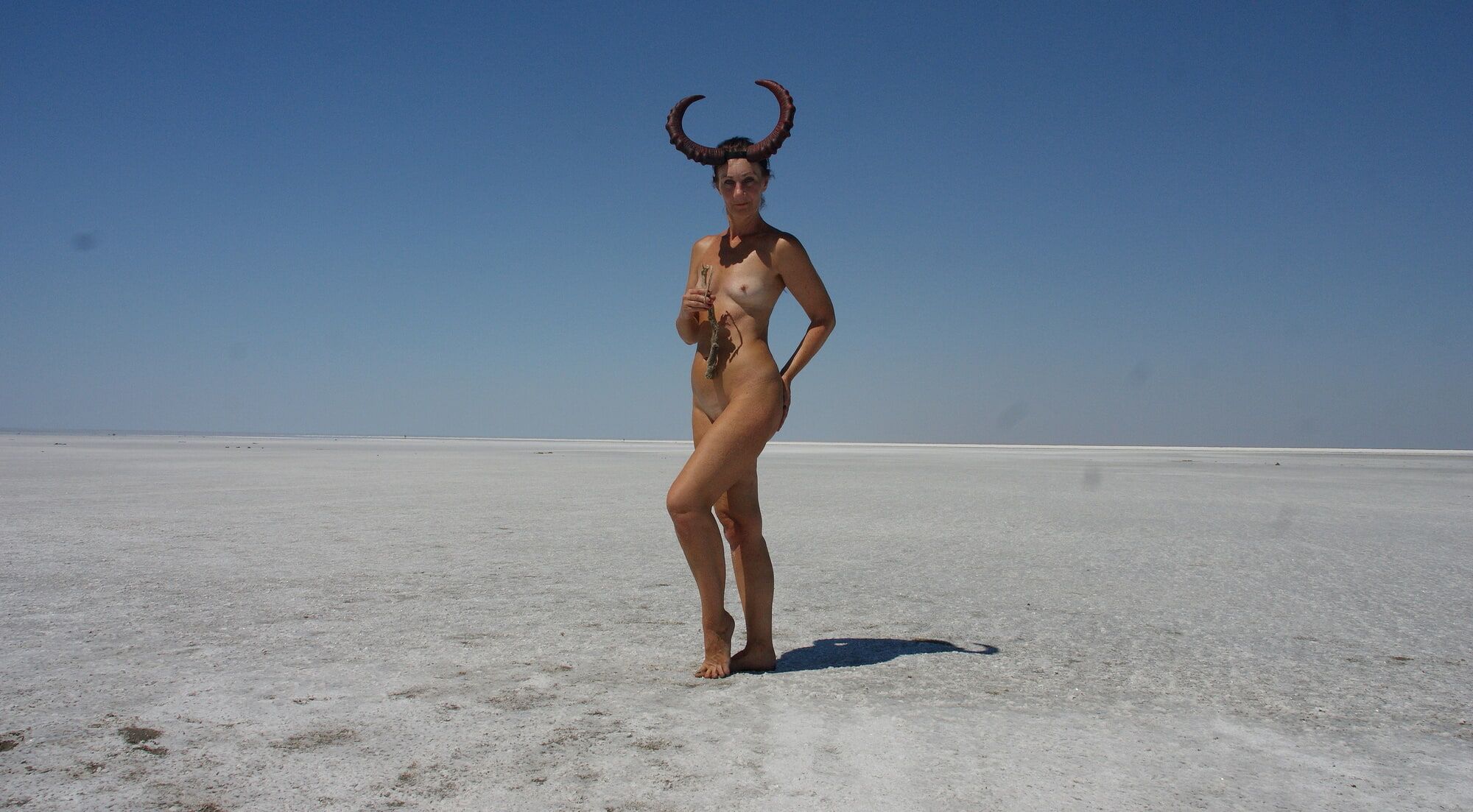Standing naked on the salt of the salt lake Elton #29