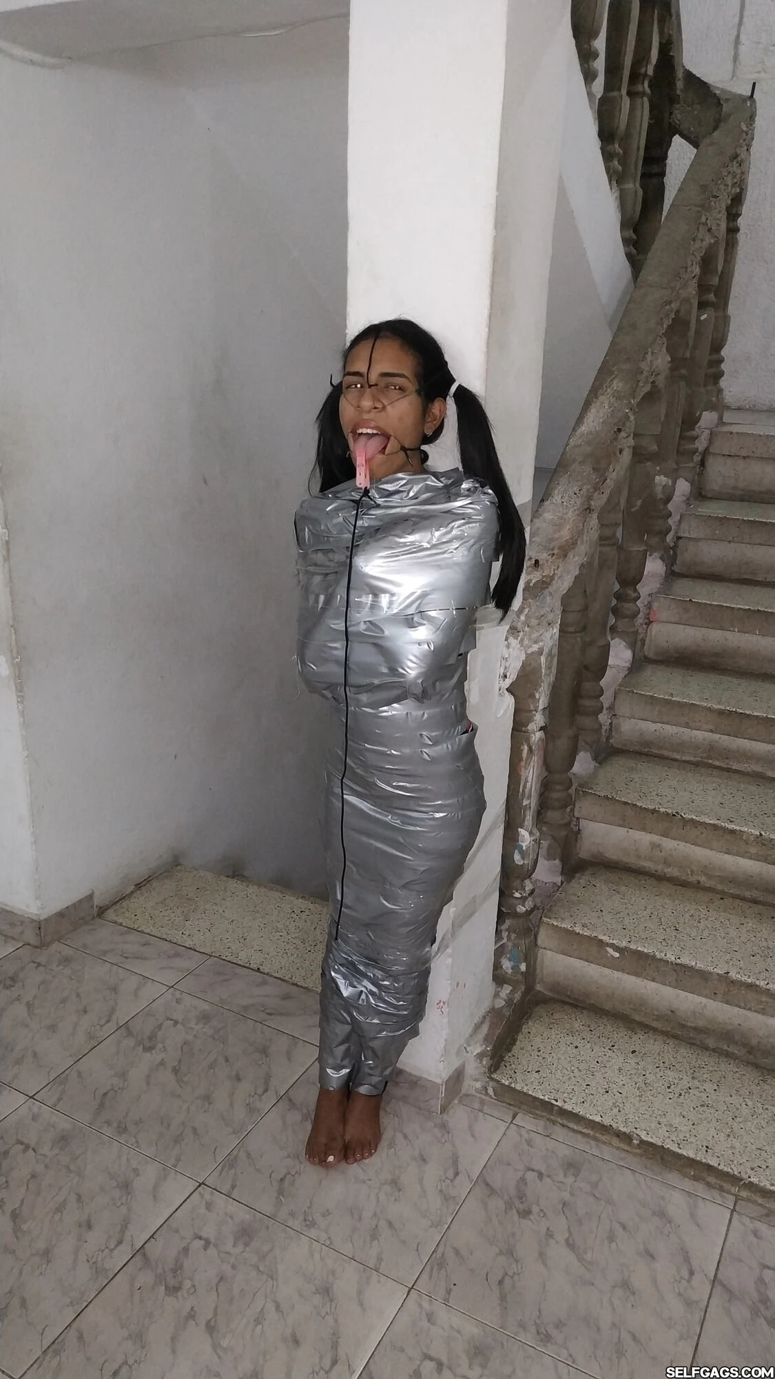 Mummified Latina Slut Mouth Hooked And Helpless 