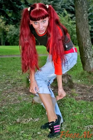 redhead outdoors strips jeans off wearing pantyhose         