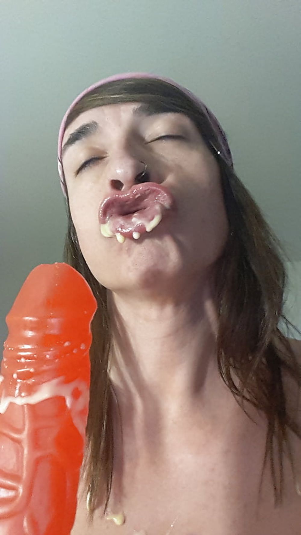 Tygra tastes her own cream. #12