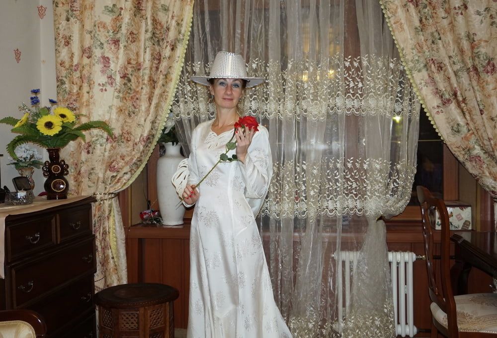 In Wedding Dress and White Hat #49