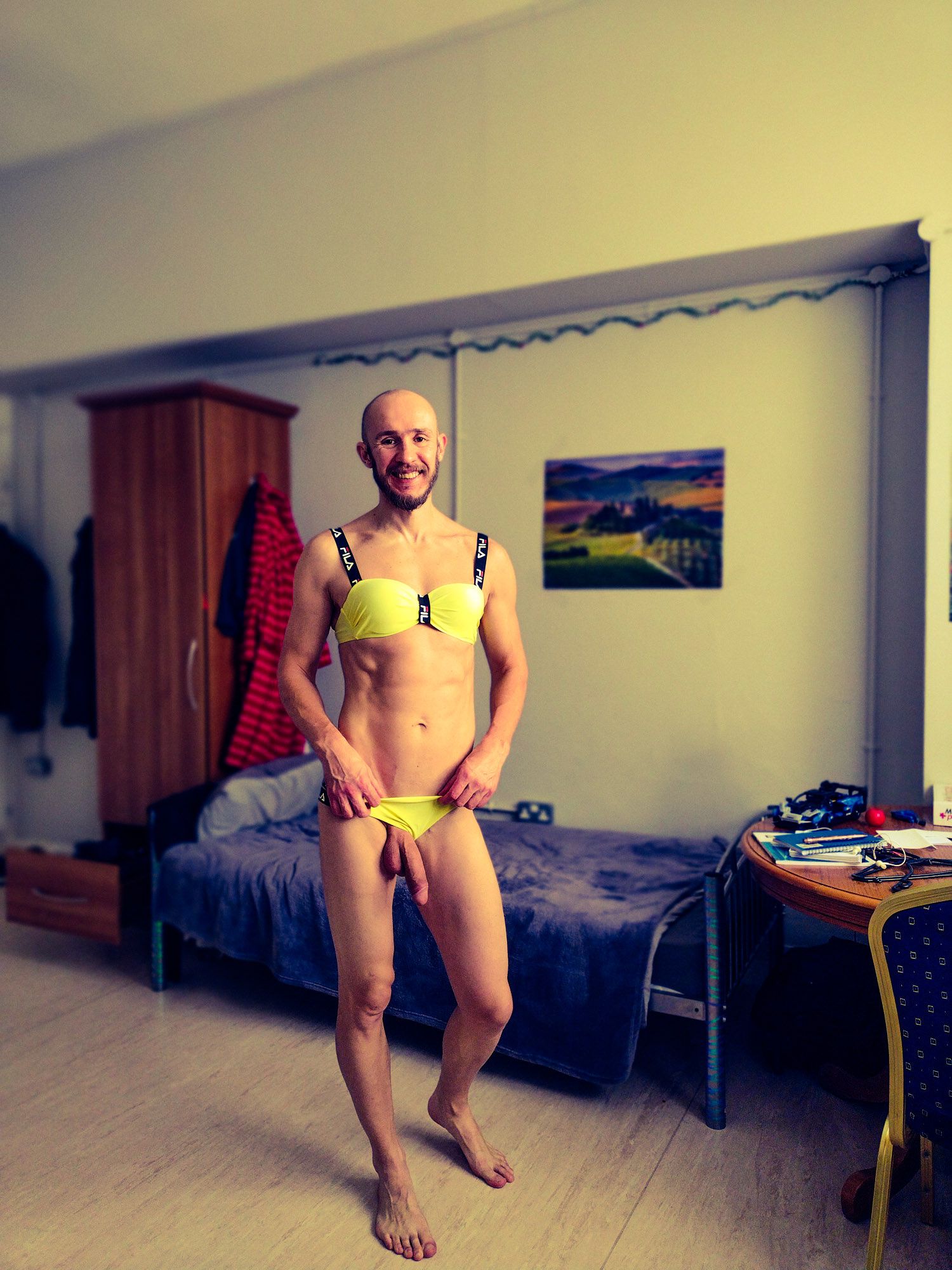 Bearded athletic man posing in yellow swimsuit  #22