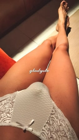 Transvestite wearing high heels and pantyhose