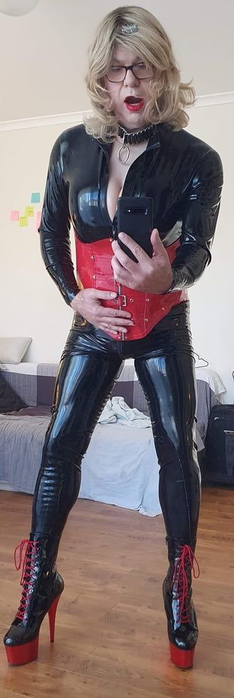Rachel Wears a Catsuit and a Red Corset #10