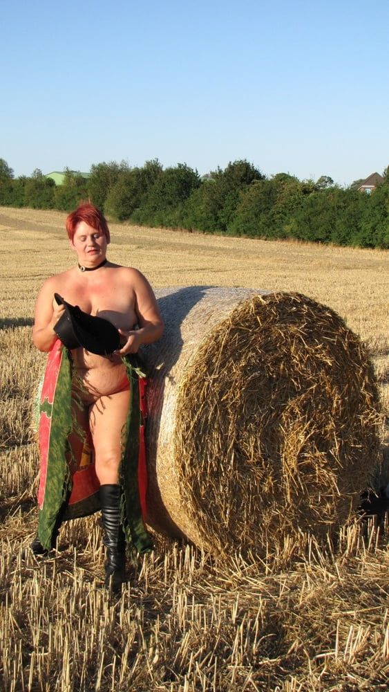 Anna naked on straw bales ... #11