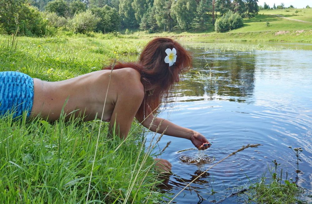 Mermaid plays with water #36