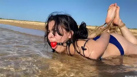 hogtied and ball gagged in sea water selfgags         