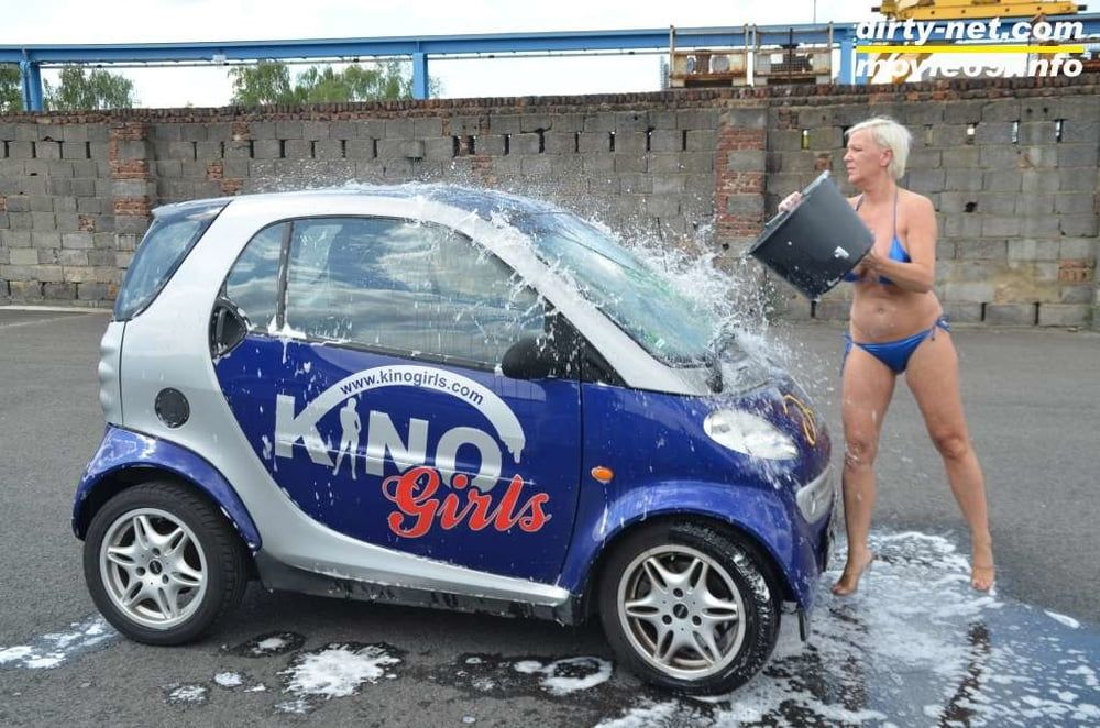 Jill Summer at the carwash in a bikini and topless #25