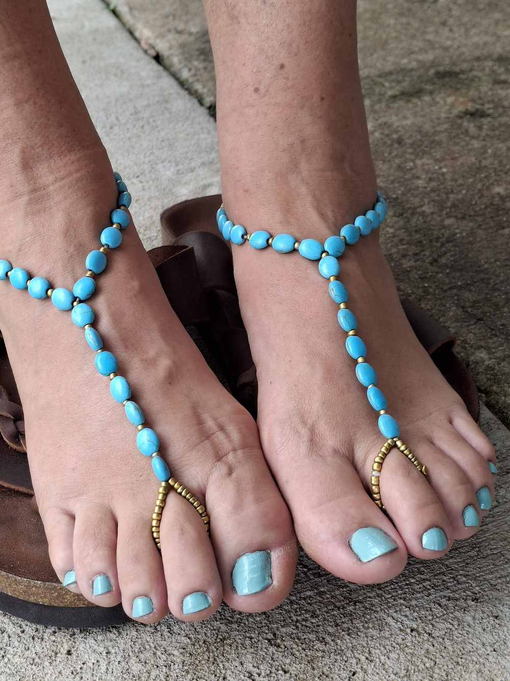 Cute feet wearing barefoot sandals #4