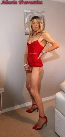    alessia travestita in red velvet dress         