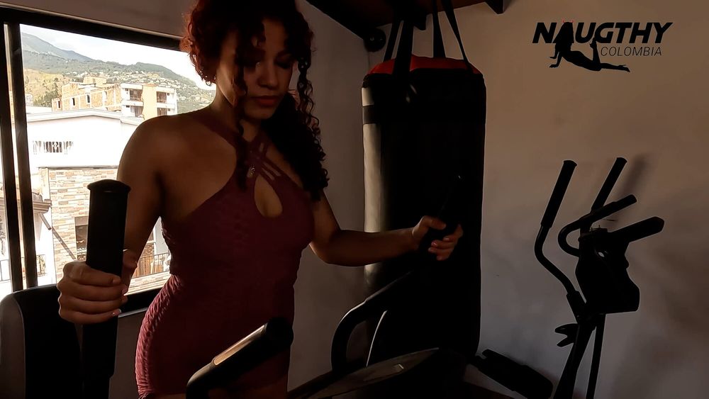 Beautiful whore masturbates in the gym