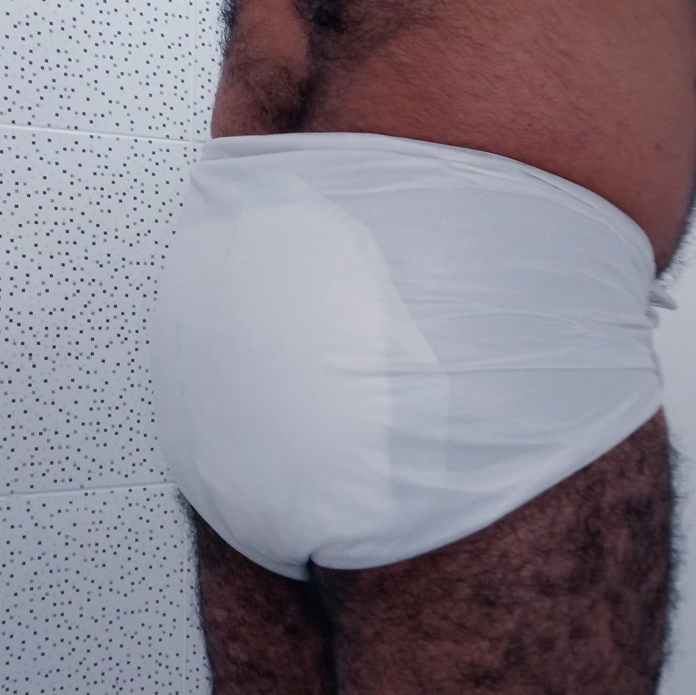 SHOWING WHITE DIAPER IN WORK BATHROOM. #7