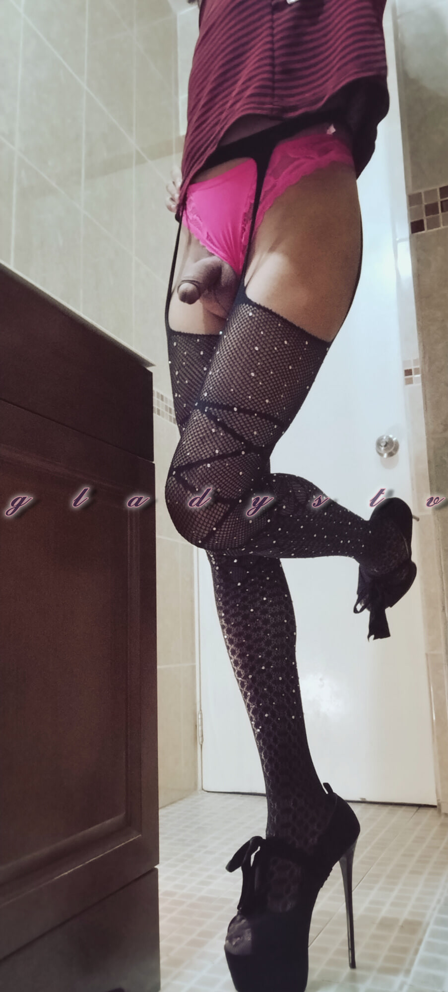 Transvestite in a miniskirt and high heels 