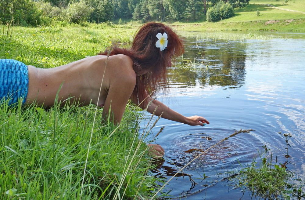 Mermaid plays with water #40