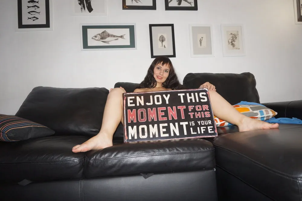 Brunette Milf On Leather Couch