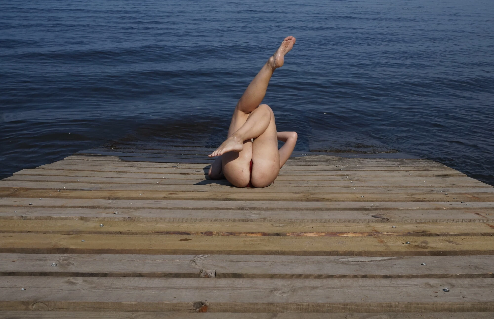 Legs play on a wooden platform #20