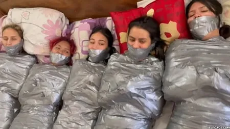   mummified girls barefoot in duct tape bondage         