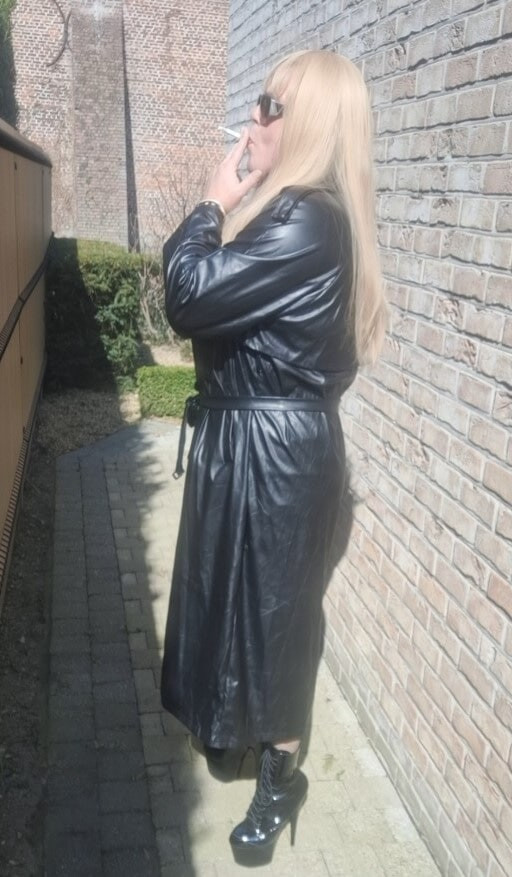 Smoking in black coat #15