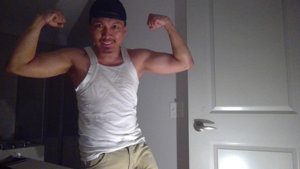 Flexing In Shorts and Tank!