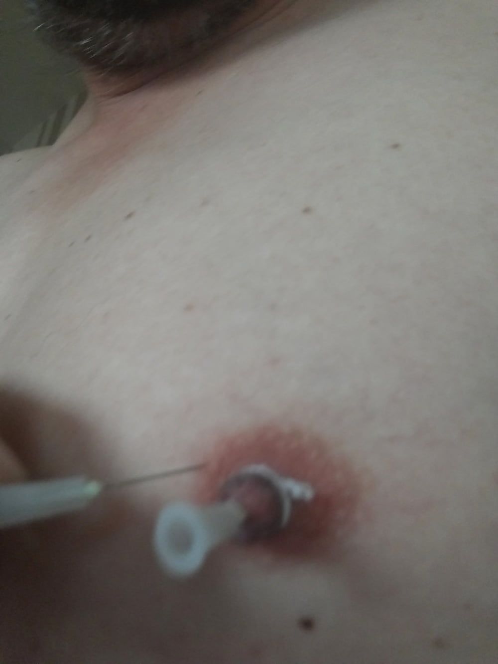 some more needles in my nipples #5