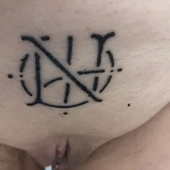 Huendin permanently marked with tattoo