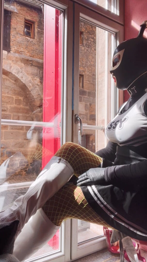 I'm sitting in the window of the red light district #11