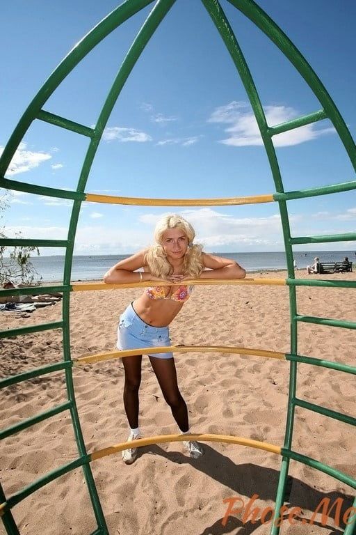 Blonde At The Beach In Jean Skirt, Black Pantyhose