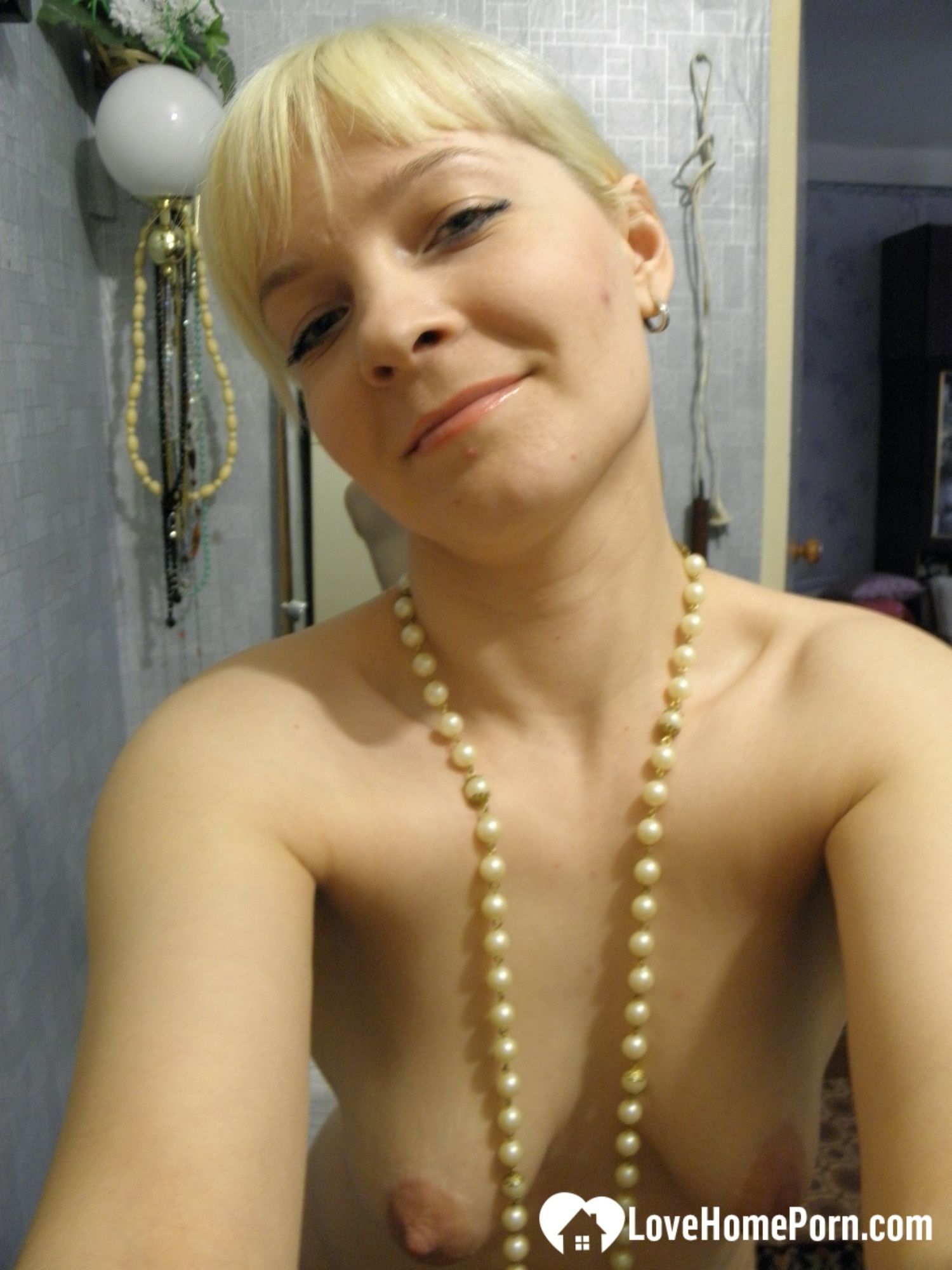 Aroused blonde in stockings taking naughty selfies #30