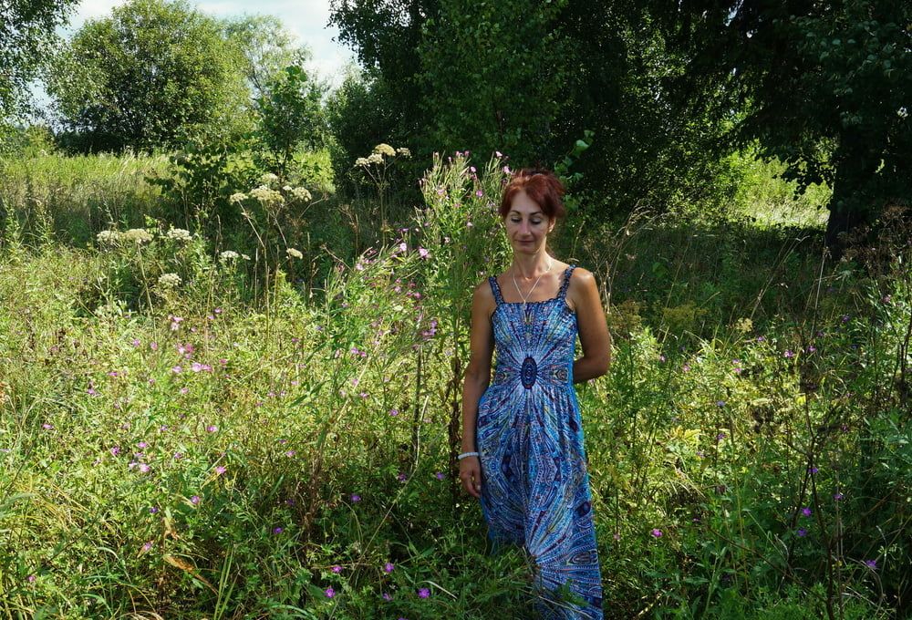 In blue dress in field #4