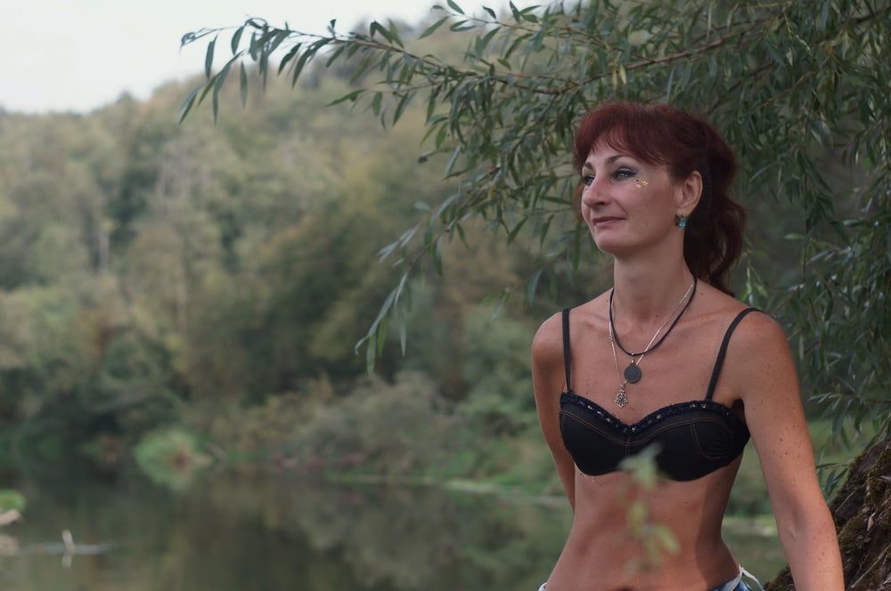 Black bikini near tree upon river #11