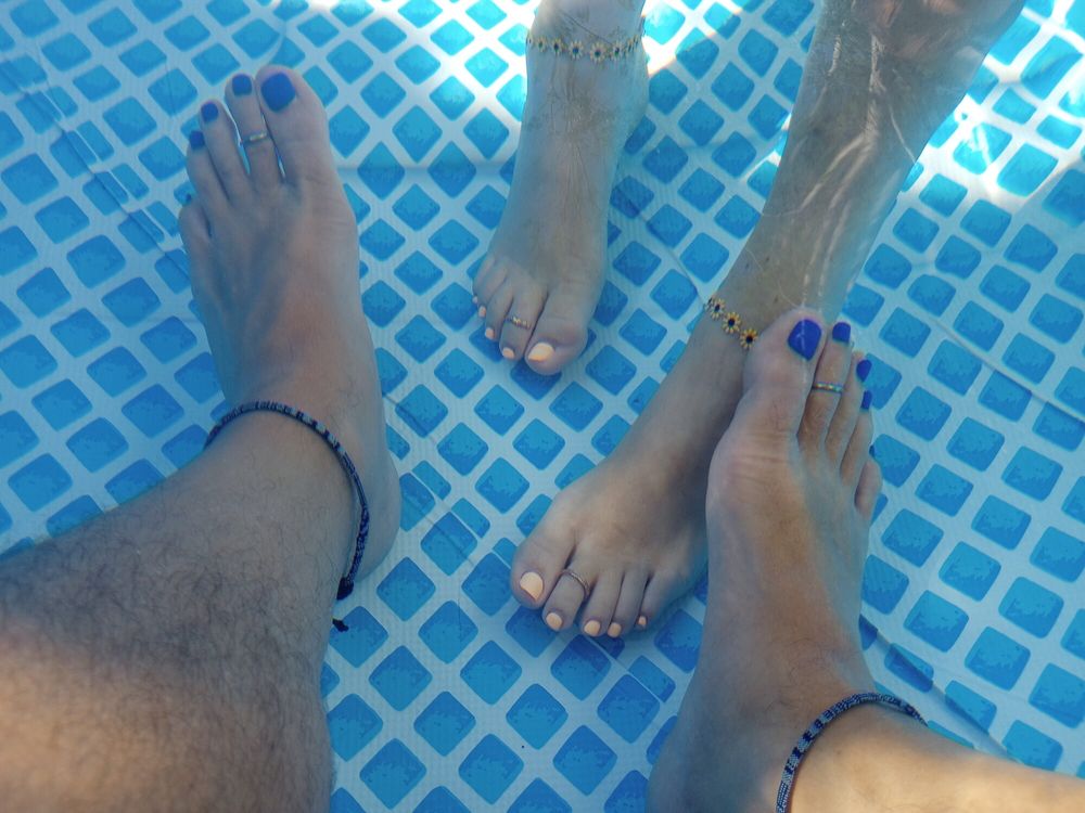 Showing off our pedicures in the pool #13