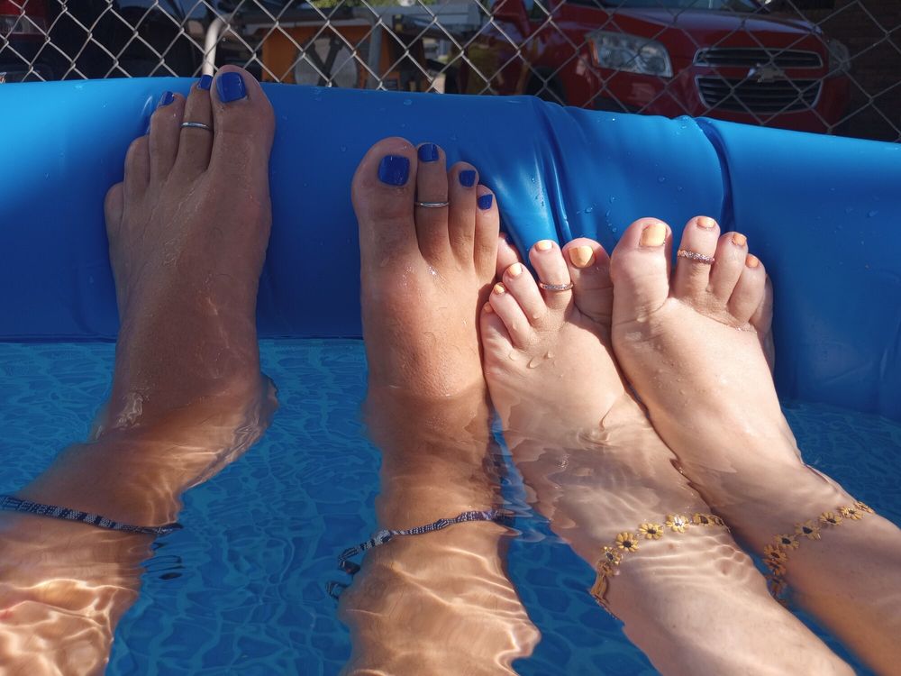 Our feet in the pool #18