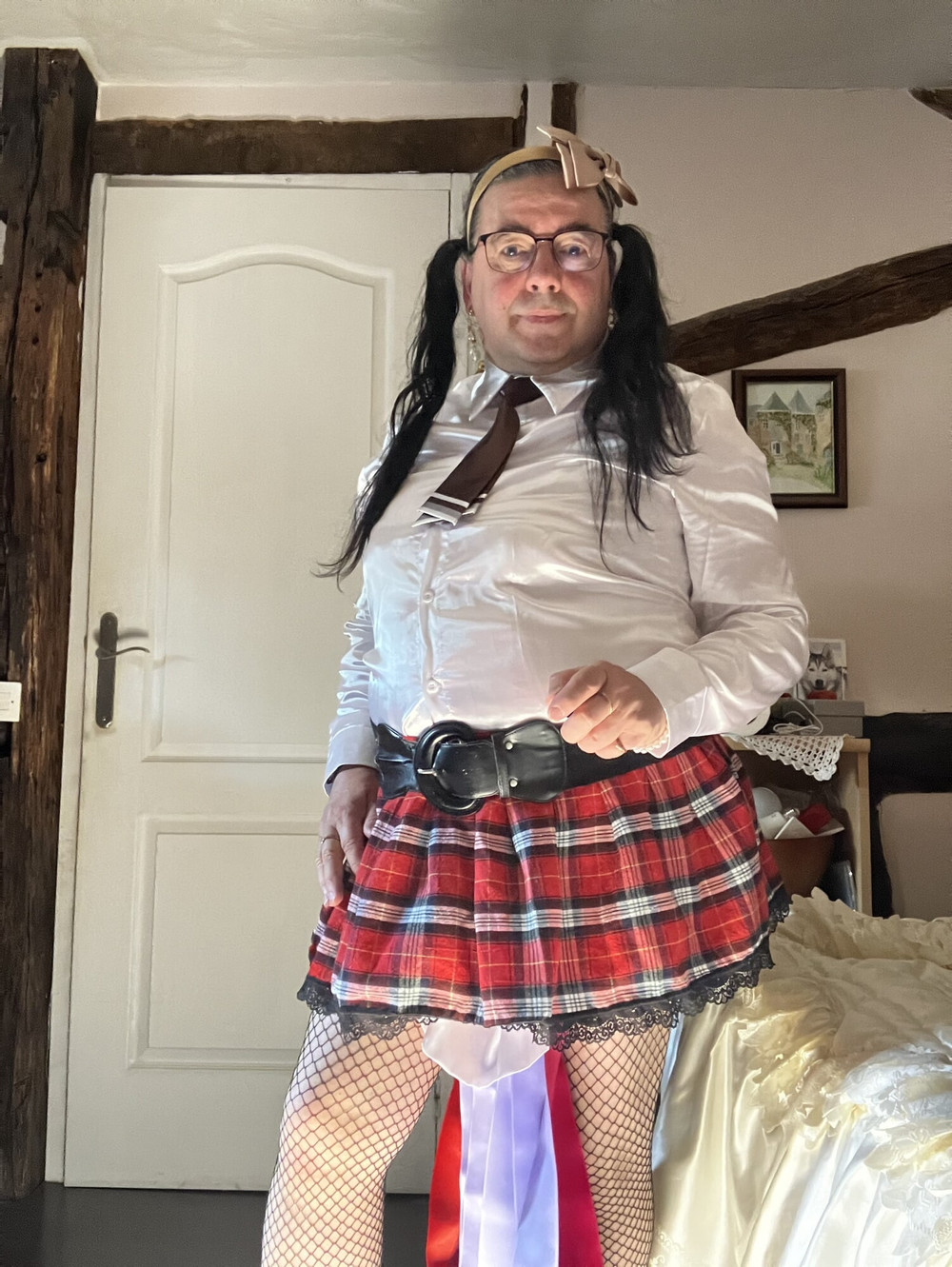 In an outfit with a little red and black skirt #7