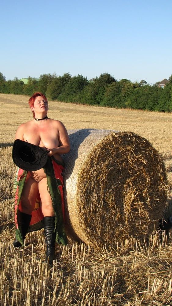 Anna naked on straw bales ... #12