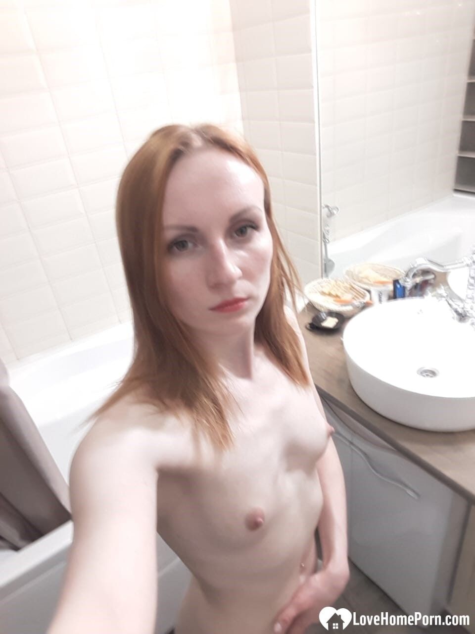 Skinny redhead girl posing in her bathroom naked #43