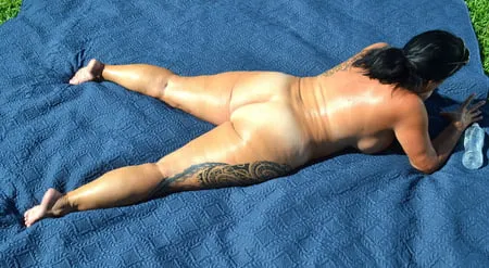 fuck toy sunbathing in yard         