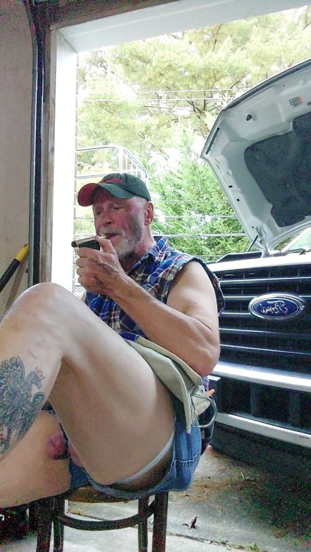 Garage mechanic smoking after work #7