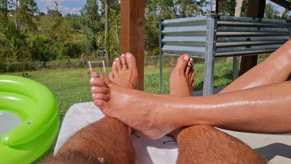 Getting some sun on our legs and feet #16