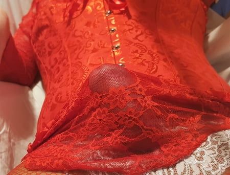 Crossdressing in red and white lingerie