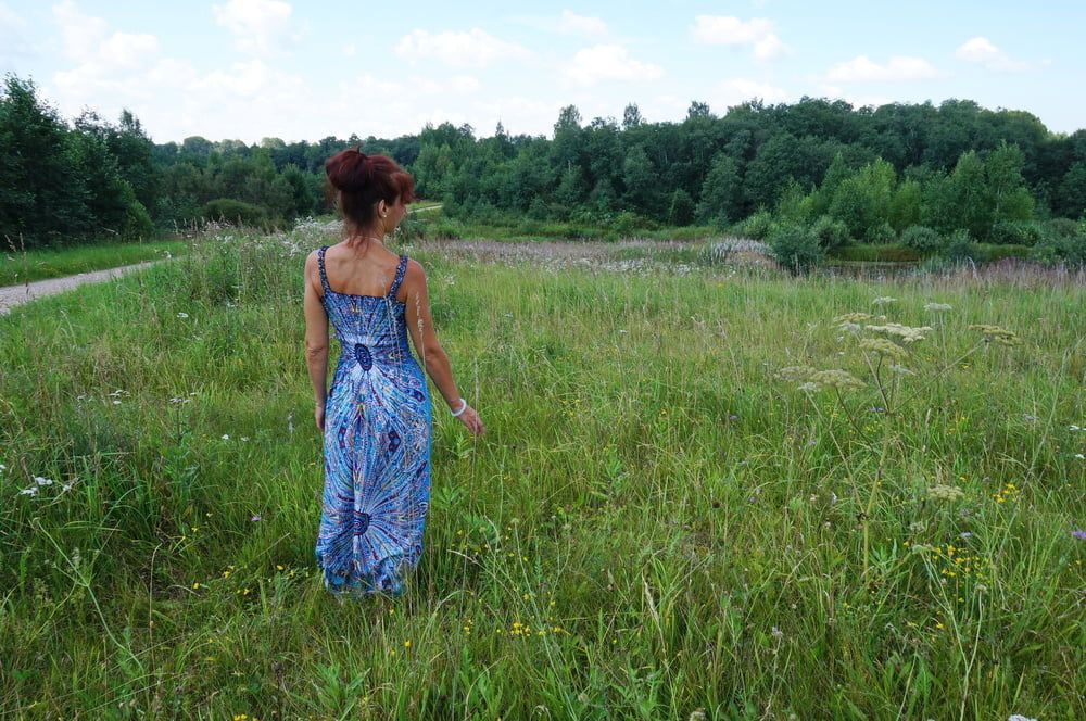 In blue dress in field #33