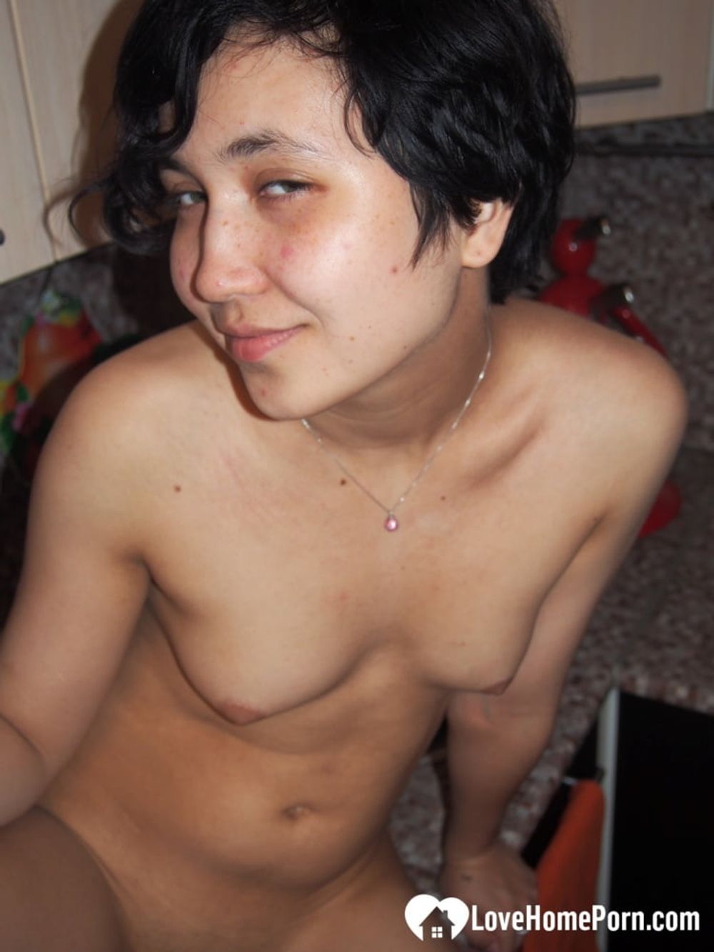 Hot tomboyish babe shows her natural tits #15