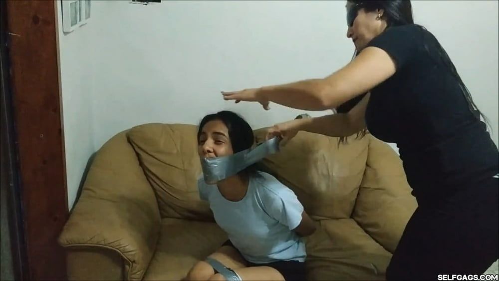 Panty Hooded Girl Gagged With Socks And Tape #24