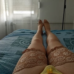 MILF trans lady touches herself in nylons and red lack toes 