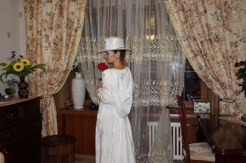 In Wedding Dress and White Hat #53