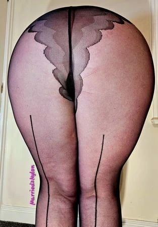 Jane showing off her new    denier seamed pantyhose         