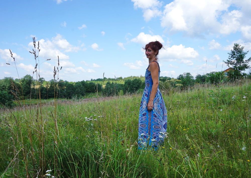 In blue dress in field #30