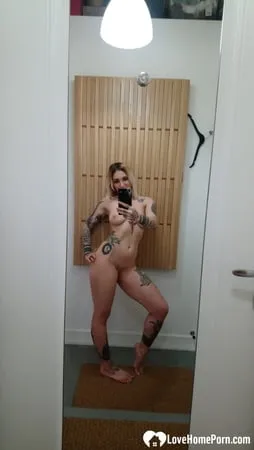 busty girl with sexy curves takes nudes         