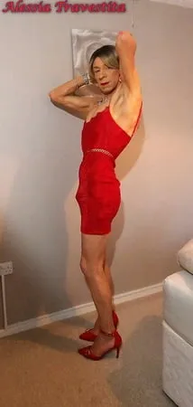    alessia travestita in red velvet dress         